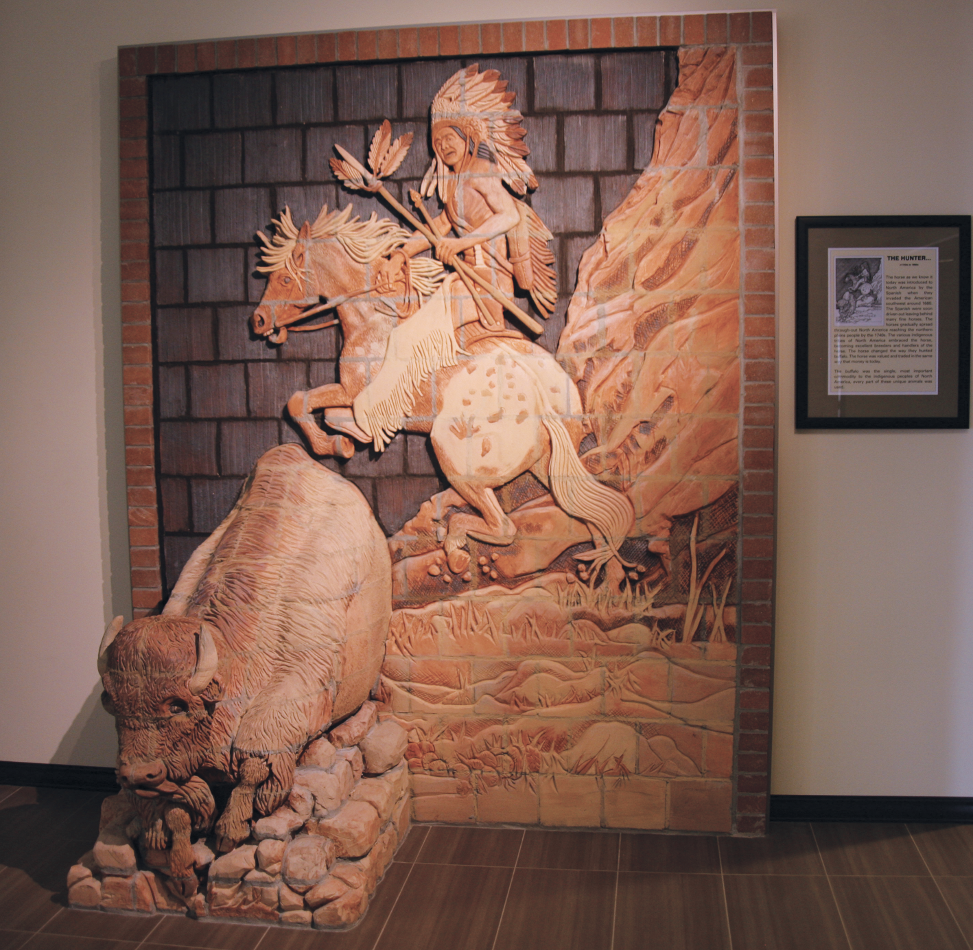  8 Marshall remade the earlier test mural (see 2) with the preferred clay body. The finished mural was sold to the new hotel built on the site of the Buffalo Jump mural in Havre, Montana. This latest addition mural depicts the hunt after the hunter-gatherer plains people got the horse in the late 1600s to early 1700s, dramatically changing their way of life for the better.