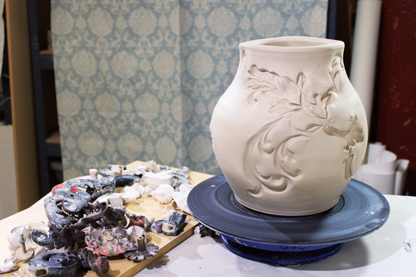 7 Use a large stamp to create movement and a continuous pattern around the jar.
