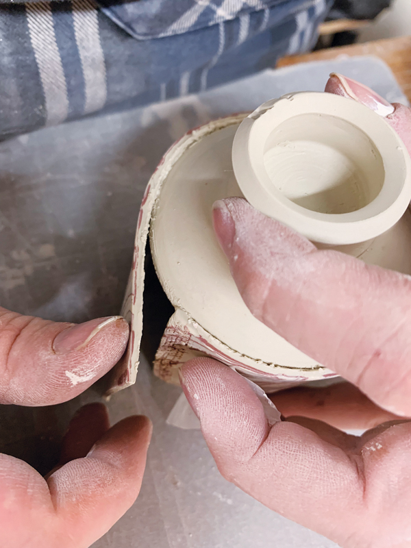 9 Attach the slab to the base, overlapping the clay to form a seam.
