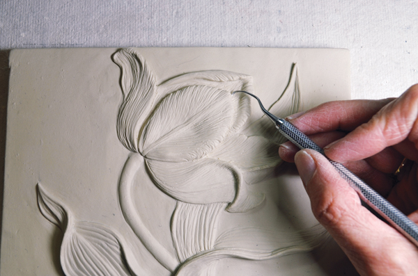 12 Make angled cuts under edges to create shadows and depth.