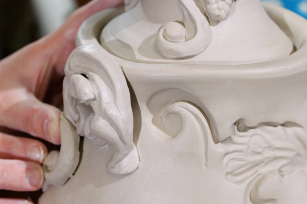 16 Place a few sprigs on opposite sides of the jar body to form handles.