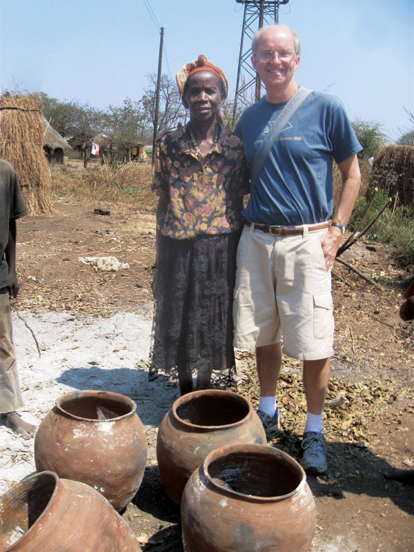 7 Author Craig Hinshaw with Eness Ngulube. 
