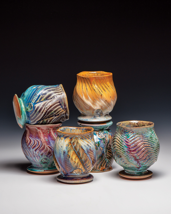 1 Dick Lehman’s double-faceted cup grouping, 4 in. (10 cm) in height, wheel-thrown and altered white stoneware, triple glazed, fired to cone 9 in reduction in a gas kiln, 2019. 