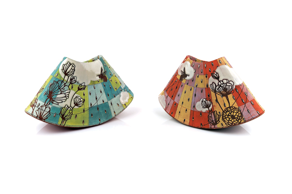 3 Renee LoPresti’s Rocking Vases, 7½ in. (19 cm) in width, wheel-thrown and altered iron-rich stoneware, underglazes, glazes, fired to cone 5 in oxidation, gold luster fired to cone 019 in oxidation, 2019.