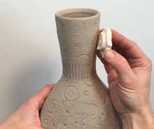 9 Finish the stamping with a geometric pattern to fill in blank spaces and balance out the visual imagery.