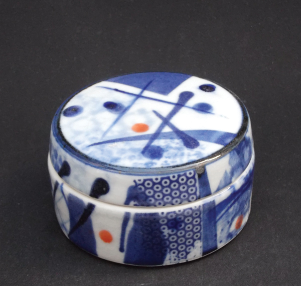 6 Lidded box, 4 in. (10 cm) in width, porcelain, blue underglaze slips, Cornish stone glaze, fired to cone 11 in reduction.