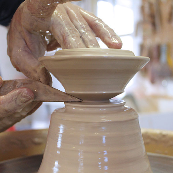 12 Use a knife to make an undercut to act as a guide to cut the lid off the hump.
