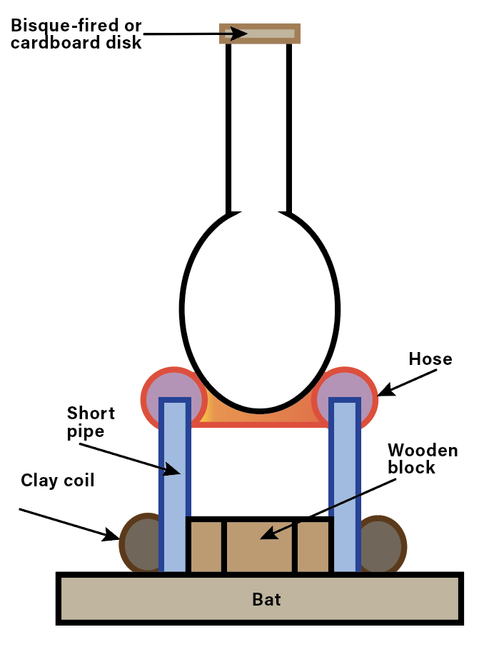 6 The chuck system with a shorter piece of PVC pipe to trim the neck and shoulder of vases. 