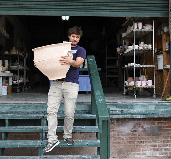 1 Jacob Meer loading a kiln.
