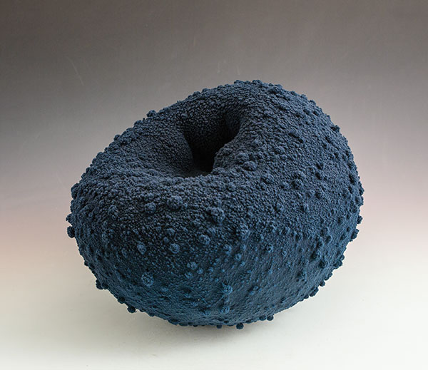 5 Maxwell Mustardo’s Blue Toroid, 10 in. (25 cm) in height, stoneware, plastic, 2018. 