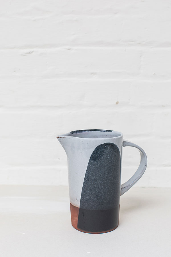 3 Silvia Kamodyova’s terra-cotta jug, 8 in. (20 cm) in height, terra-cotta casting slip, tin glaze, fired to 2192°F (1200°C), 2018. Photo: Emma Croman. 