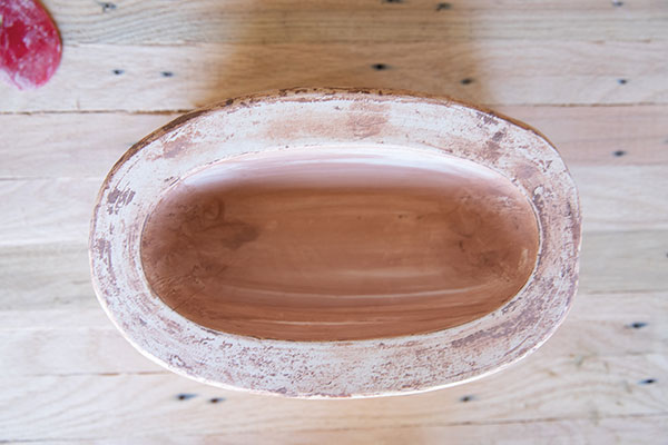 1 Oval, dome-shaped plaster press mold used to create the lid for the butter dish.