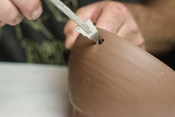 1 Use a Kemper drill tool to create chopstick holes sized for shrinkage.