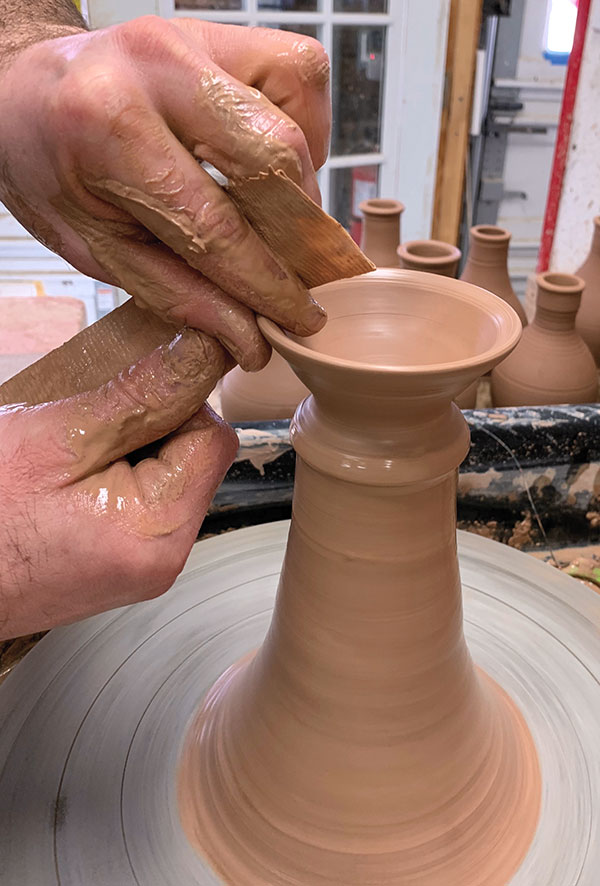 6 Taper the lip with a chamois to ensure future smooth pouring.