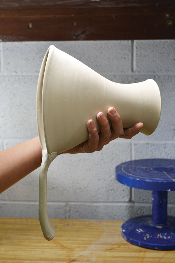 8 Pull the handle with wet fingers to loosen it and make it more pliable. 