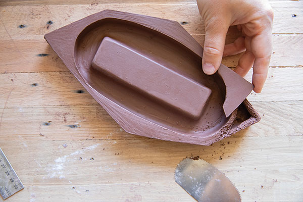 10 Attach slabs to the top to enclose the hollow, double-walled form. 