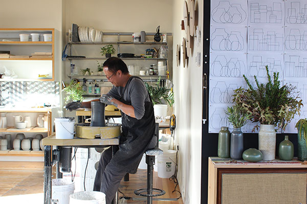 1 Tung Chiang, Clay Studio director, throwing on the wheel.