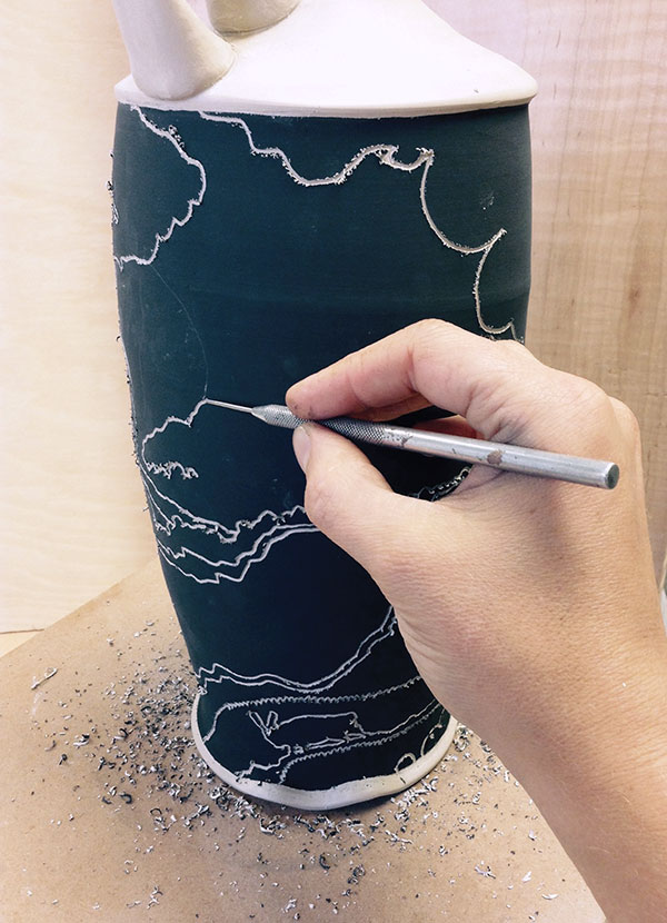 3 Use a blunt needle tool to block in big silhouette shapes.