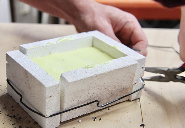 7 After firing, remove the tie wire from the soft-brick mold.