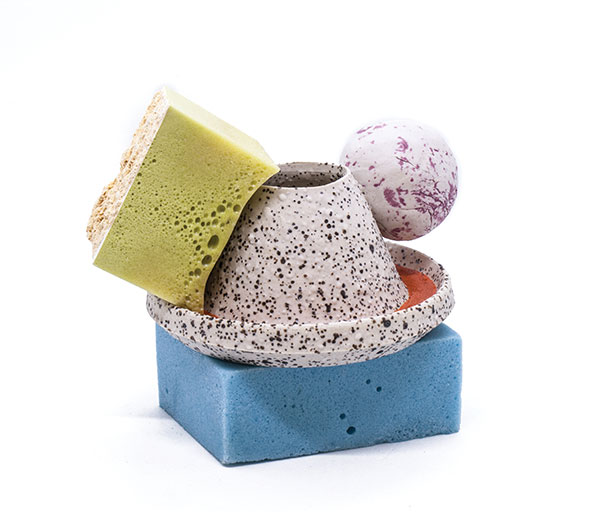 Cup with blue saucer and green glaze chunk, 6 in. (15 cm) in height, wheel-thrown porcelain, fired to cone 9 in oxidation, cast and sculpted glaze, fired to cone 02, 3, and 1 in oxidation, 2019.