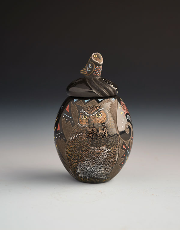 9 Jennifer Tafoya (Santa Clara), owl lidded jar with incised owl and floral designs, 3 in. (8 cm) in height, clays and slip.