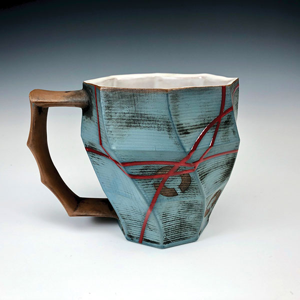 Curt Hammerly and Eric Heerspink’s collaborative mug, 4 1/2 in. (12 cm) in height, red stoneware, terra sigillata, glaze, fired to cone 5 in an electric kiln, 2019.