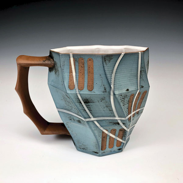 3 Curt Hammerly and Eric Heerspink’s collaborative mug, 4 1/2 in. (12 cm) in height, red stoneware, terra sigillata, glaze, fired to cone 5 in an electric kiln, 2019.