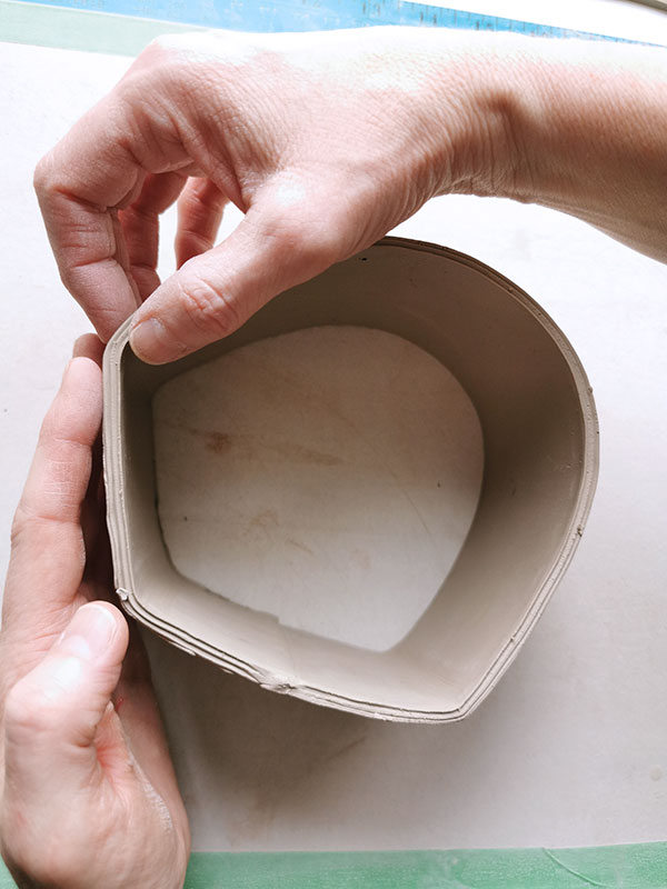 2 Remove the form, then alter the body, working from the bottom of the cylinder to the top to create flat planes.