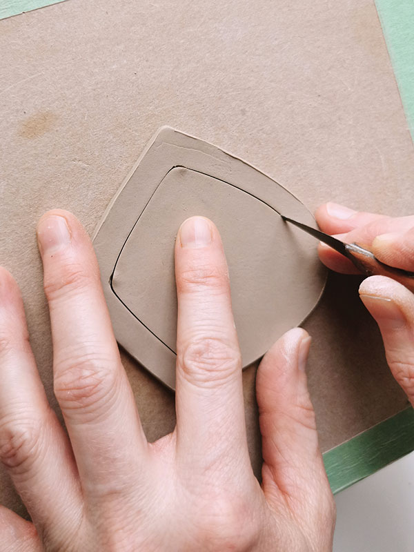 7 Cut a lid assembly using a template. Turn it over, template side down. Cut inside the perimeter to create a collar.