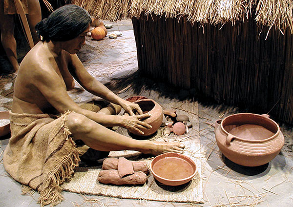 1 Diorama representing a woman potter in Cahokia. Courtesy of Cahokia Mounds State Historic Site. 