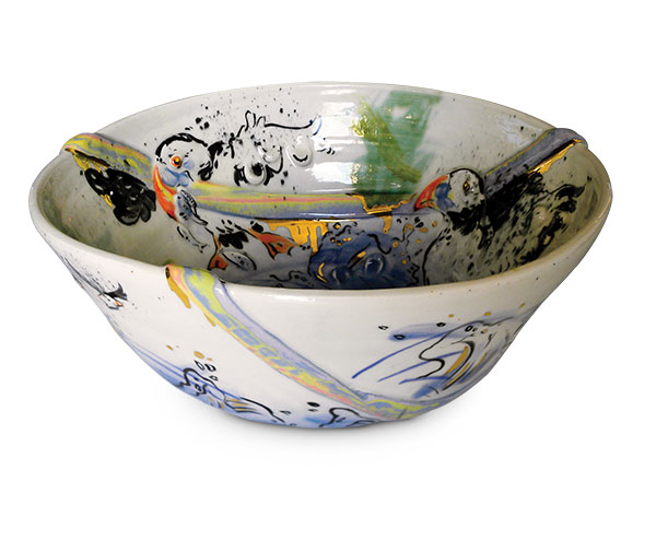 2 Emilie Bouvet-Boisclair’s Puffin and Rainbow Bowl, 12½ in. (32 cm) in diameter, porcelain, colored clay, underglaze, glaze, fired to cone 6 in oxidation, 22k gold luster, 2018.