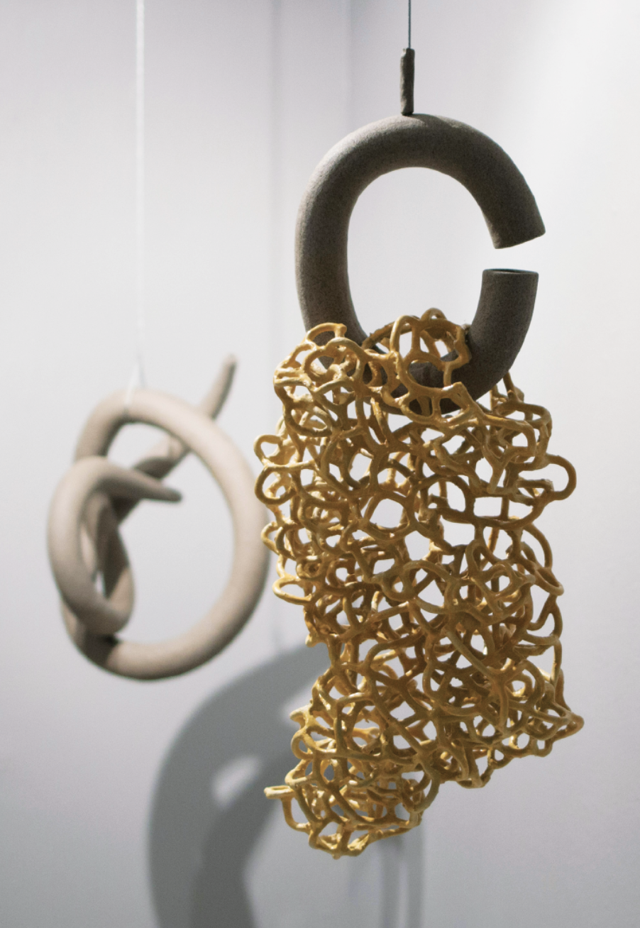 1 Diana Butucariu’s Trying to Connect I and II, to 27½ in. (70 cm) in height, stoneware, fired in oxidation to 2282°F (1250°C), 2017.