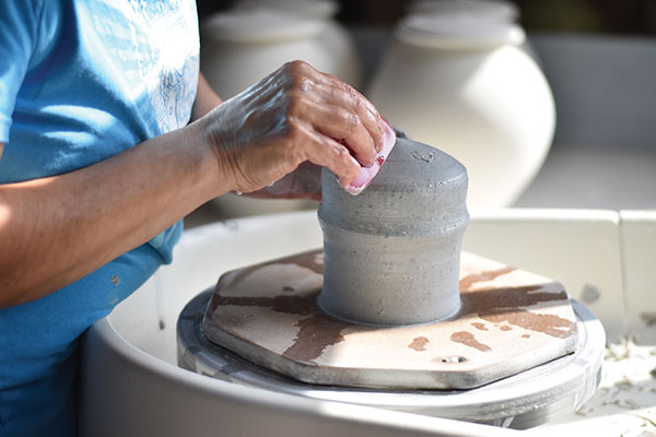 7 Compress, shape, and smooth the surface using a soft rubber rib. 