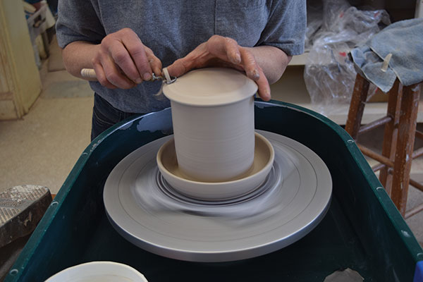 7 Once both parts are leather hard, place the lid on the base and lightly trim across the top.