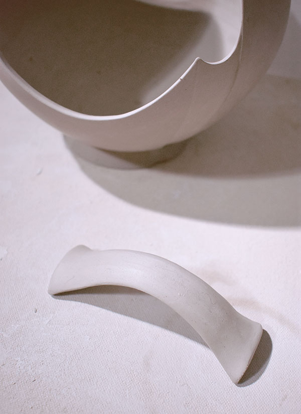 11 Smooth the lugs into the handle to hide the seams. Set aside to stiffen slightly.