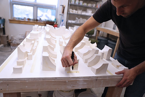 6 Write out the numbering system on the tape for painting the mold parts.