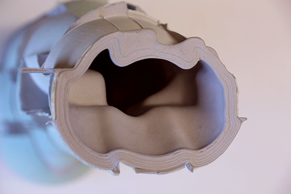 14 The thick casting allows for slip rings to develop and the mold height differences provide places for pour over.