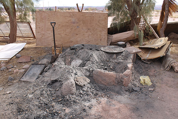 8 Pit kiln at Aracena’s studio, where he fires his reproductions of Pre-Columbian vessels. 