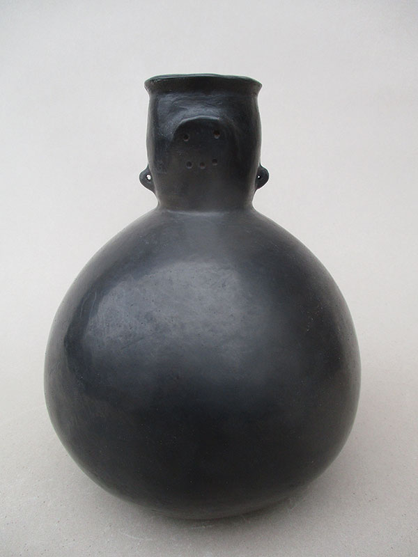 2 Negro Pulido reproduction by Luis Aracena, 7 in. (18 cm) in height, purchased from the Explora gift shop.