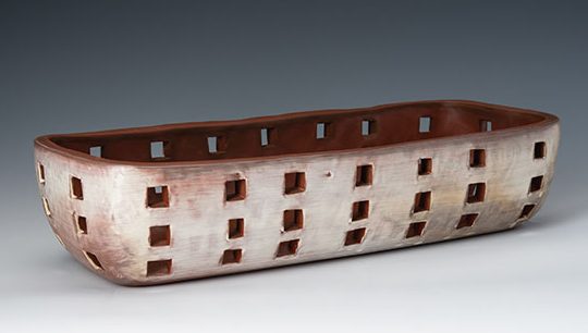 Basket, 15 in. (38 cm) in length, handbuilt cone-3 earthenware, terra sigillata, wood/soda fired, 2019. Photo: Ann Cady.