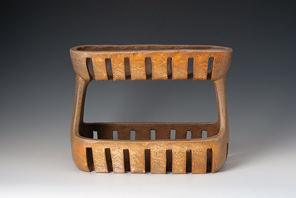 Double-tiered basket, 12 in. (30 cm) in length, cone-3 earthenware, terra sigillata, wood/soda fired. Photo: Ann Cady.