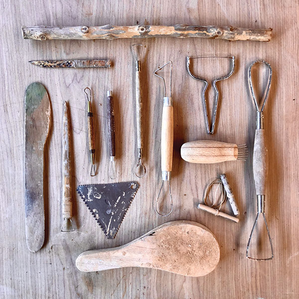 Fig 1 Kurinuki tools include paddles, loop tools, wire tools, and found objects.