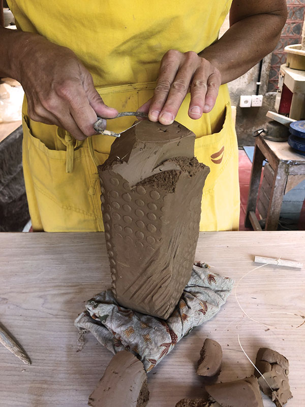 8 Make cuts into the form with wire tools, fettling knives, and cheese cutters.