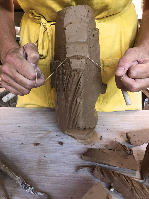 Fig 9 Turn the vessel right-side up and continue to shape the form.