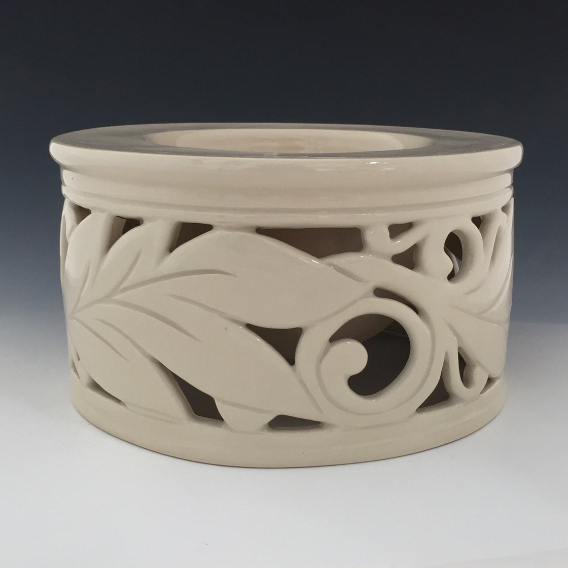 Maxine Hugon, Ajouré, double-walled vase, 7 in. (18 cm) in diameter, stoneware, fired to cone 6 in oxidation, 2020. www.maxpottery.com  