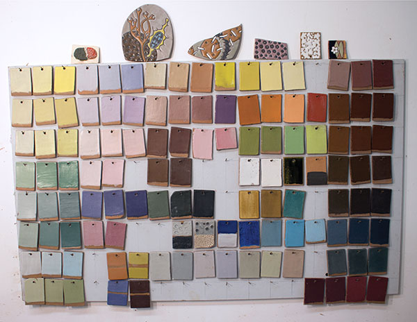 9 Sample board showing matte, glossy, and textured glazes in a variety of colors.