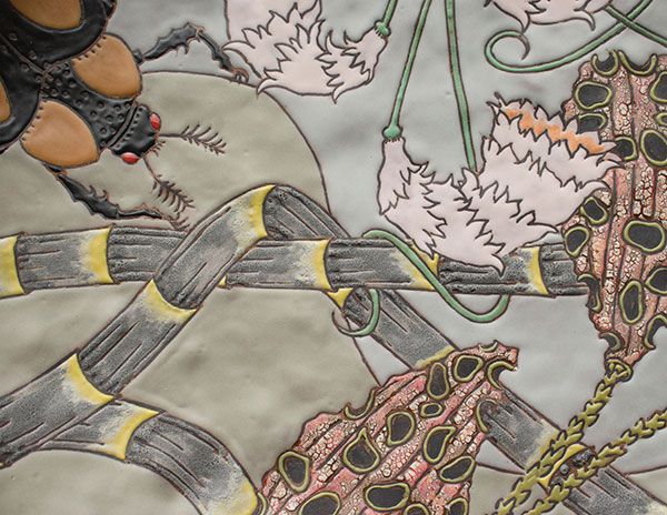 10 Detail of the plate fired to cone 2, showing glazed areas within cuerda-seca lines. 