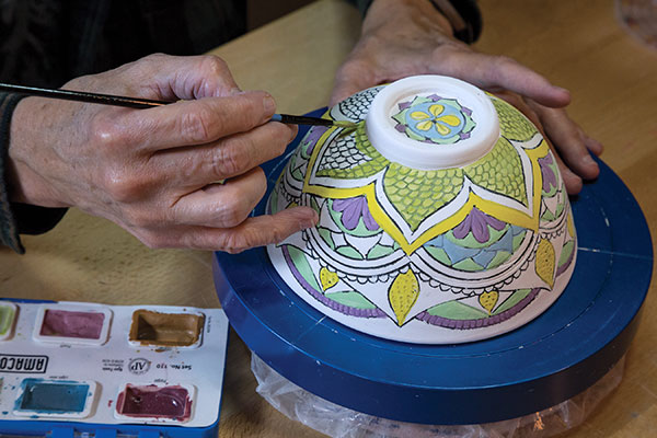 10 Paint the mishima piece with colored underglazes as desired, then allow to fully dry.