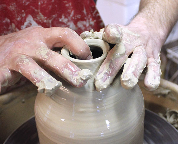 7 Collar in until the rim is sufficiently closed in to create the spout.