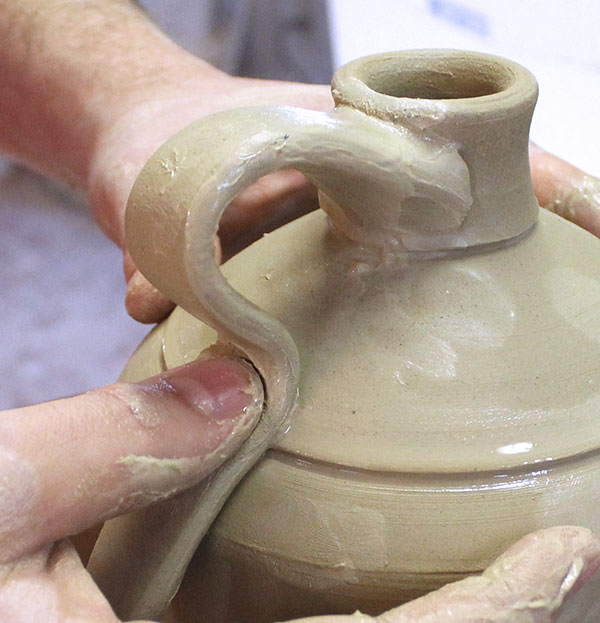18 Then give it a gentle press with your thumb to attach it.